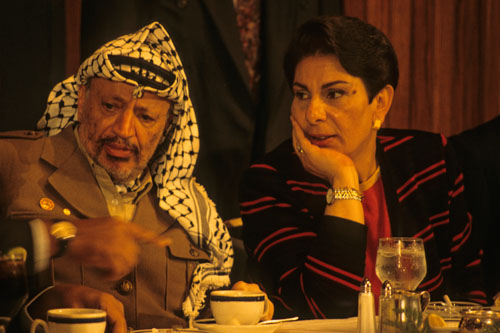 Israel objected to the PLO participation in the Madrid Conference, but Hanan Ashrawi and other Palestinian delegates could not act without previous consent from Yasser Arafat (both in this 1991 photo). @All Rights Reserved
