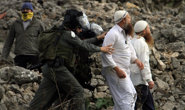 Israeli soldiers with Jewish settlers near the West Bank village of Burin near Nablus, 02 February 2013. @EPA/Alaa Badarneh | EPA