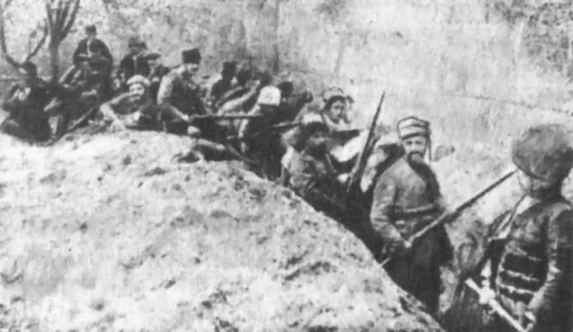 Armed Armenian civilians and self-defense units holding a line against Ottoman forces in the walled Siege of Van in May 1915. @DR