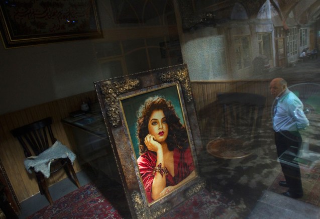 A trader stands in Tabriz historic market, 633 km (393 miles) northwest of Tehran, early in the morning of August 28, 2011. The Tabriz market was located along the Silk Road trade route and comprised of interlinked structures and spaces for various commercial, religious and educational uses. This market was registered as a UNESCO heritage site on July 31, according to UNESCO's website. @Morteza Nikoubazl)