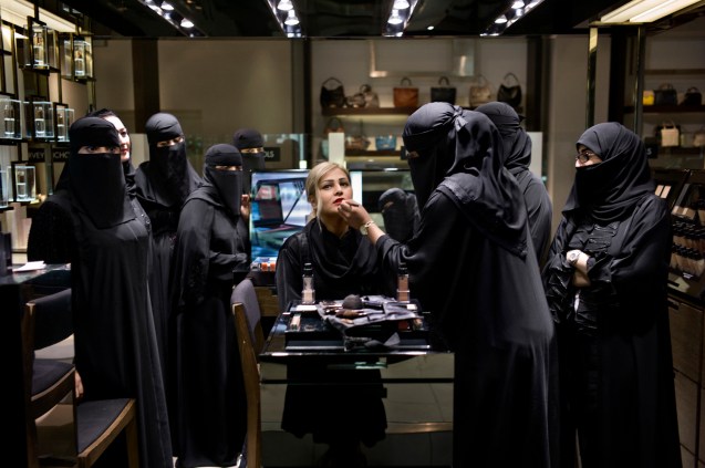 Sara, age twenty-seven, works at the Dior cosmetics counter at Harvey Nichols. Many saleswomen report that their families treat them differently now that they are financially independent. “Husbands respect women who are working,” Sara said. @ Kate Brooks Photography | The New Yorker