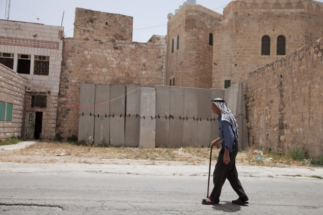 Hebron is a place venerated by the three monotheistic religions, as it holds sacred tombs of Abraham, a prophet common to all three, and his family. But only a short stroll is needed to convince us that here there is more sinning than sanctity. Recent and ancient massacres still haunt the population, especially the ones living in the Old Quarter, known as “Ghost Town”. @Udi Goren