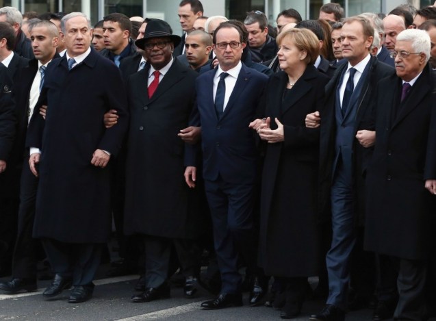 World leaders and dignitaries, including, from left, Israeli Prime Minister Benjamin Netanyahu, Malian President Ibrahim Boubacar Keita, French President François Hollande, German Chancellor Angela Merkel, European Council President Donald Tusk and Palestinian Authority President Mahmoud Abbas, attend a unity rally Sunday in the wake of last week's attacks in Paris. ( © Dan Kitwood/Getty Images)