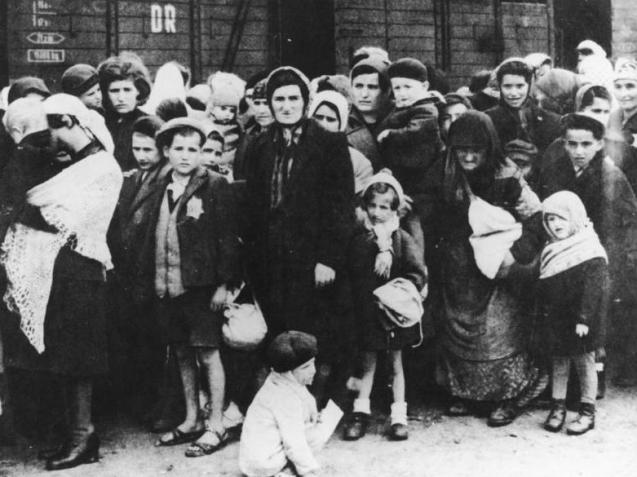 Jewish women and children from Carpatho-Ruthenia after their arrival at the Auschwitz death camp. May/June 1944. © All Rights Reserved